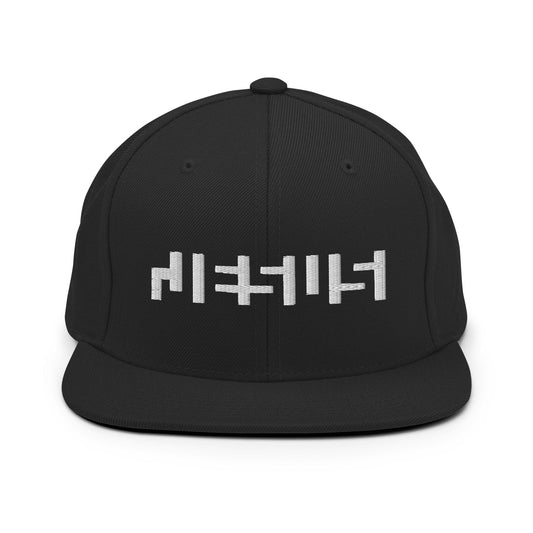 Black snapback with "Jesus" in white embroidery