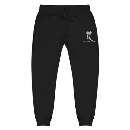 front view of black Joggers with Konsecrate Signature logo on upper left leg