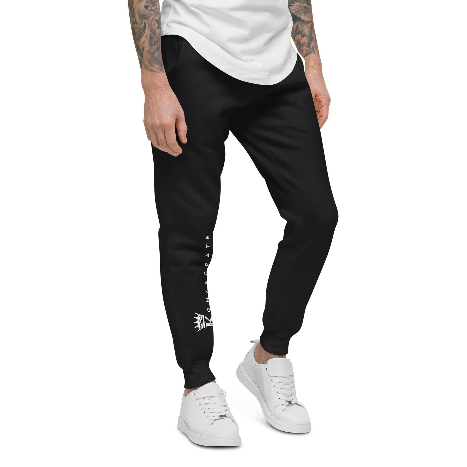 Right leg side view of Man wearing Black Konsecrate Signature Jogger 