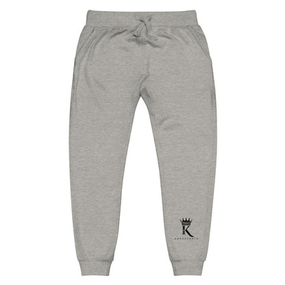 front view of carbon grey Joggers with black Konsecrate Signature logo on left leg