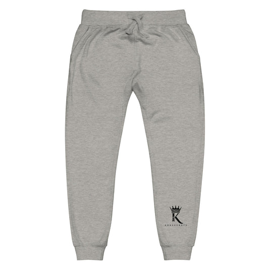 front view of carbon grey Joggers with black Konsecrate Signature logo on left leg