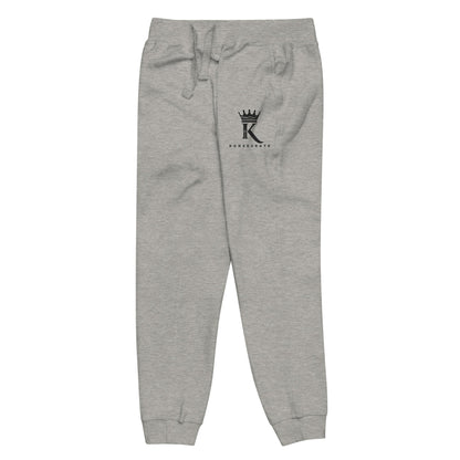 left view of carbon grey Joggers with black Konsecrate Signature logo