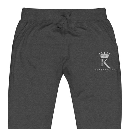 front view close-up of charcoal heather Joggers with Konsecrate Signature logo on upper left leg