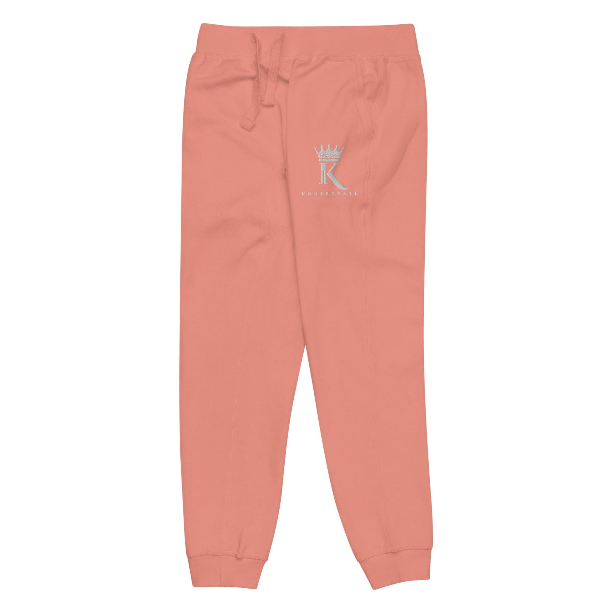 left view of dusty rose Joggers with Konsecrate Signature logo on upper left leg