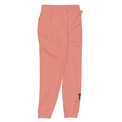 right view of dusty rose Joggers with black Konsecrate Signature logo on left leg