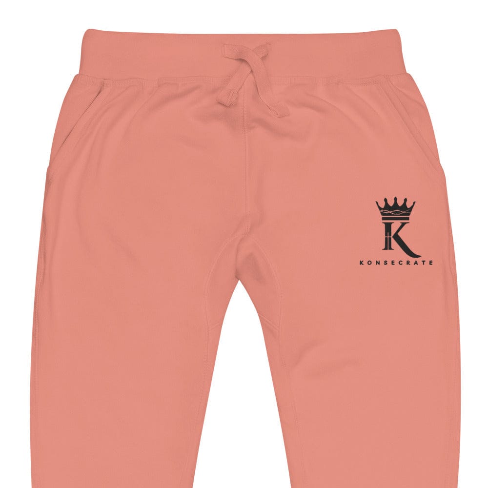 front view close-up of dusty rose Joggers with black Konsecrate Signature logo