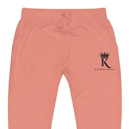 front view close-up of dusty rose Joggers with black Konsecrate Signature logo