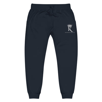 front view of navy blazer Joggers with Konsecrate Signature logo on upper left leg