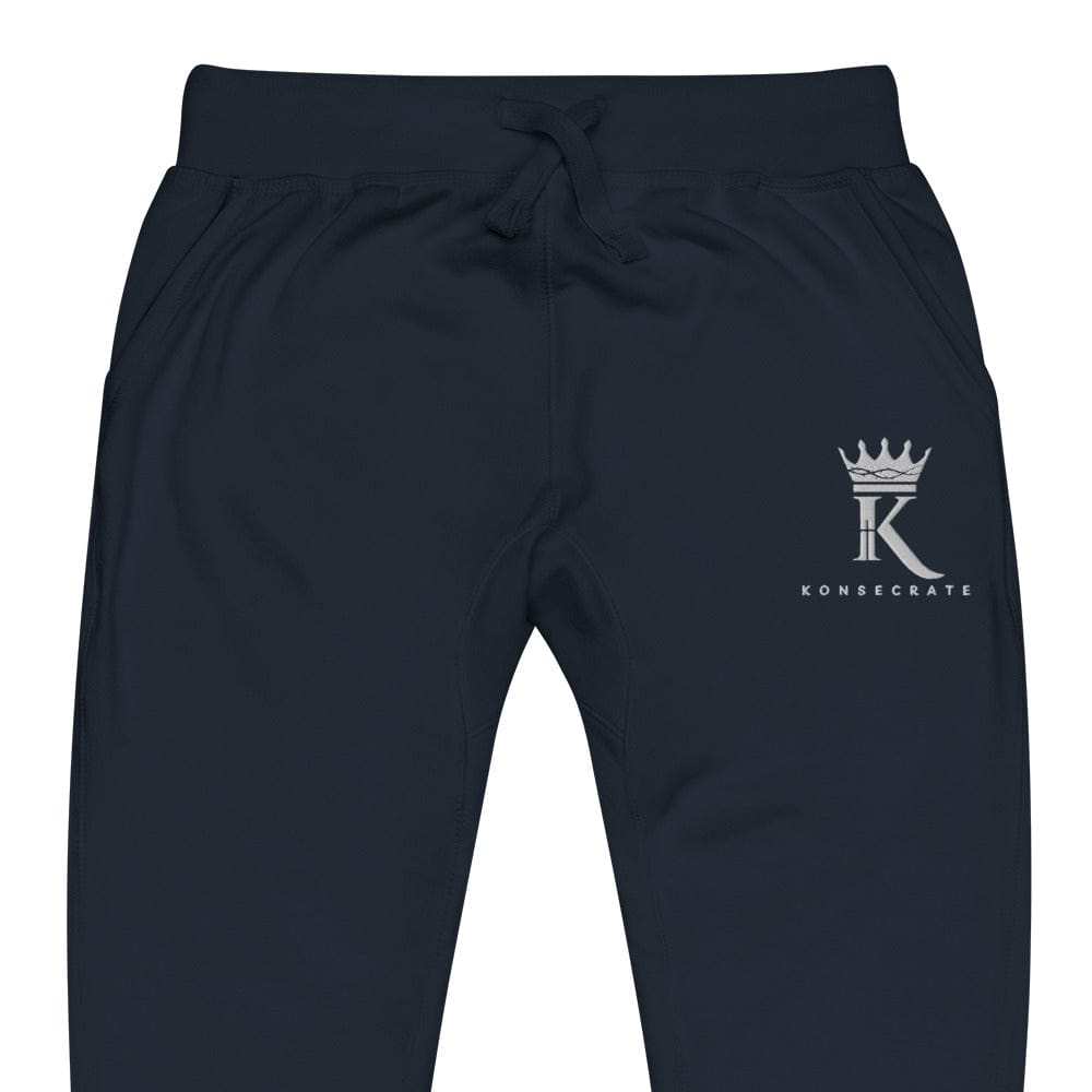 front view close-up of navy blazer Joggers with Konsecrate Signature logo on upper left leg